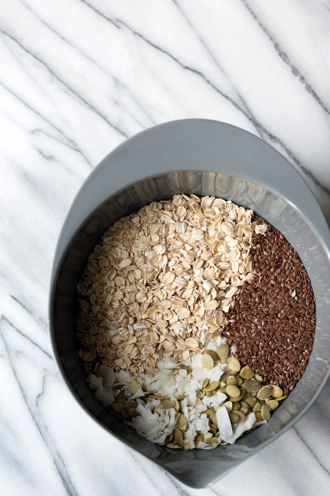 This Granola Yogurt Breakfast Bowl features an easy homemade granola that can be prepared in advanced for weeks worth of quick, delicious, healthy breakfasts. SavorySimple.net