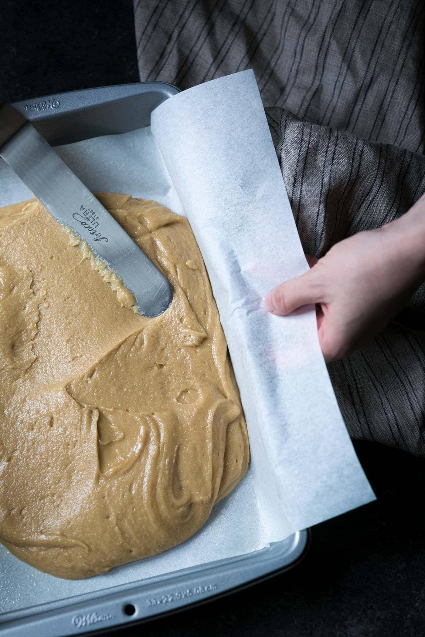 These decadent Salted Chocolate-Swirled Tahini Cashew Bars are soft, rich, and a perfect balance of flavors. Perfect for parties! SavorySimple.net