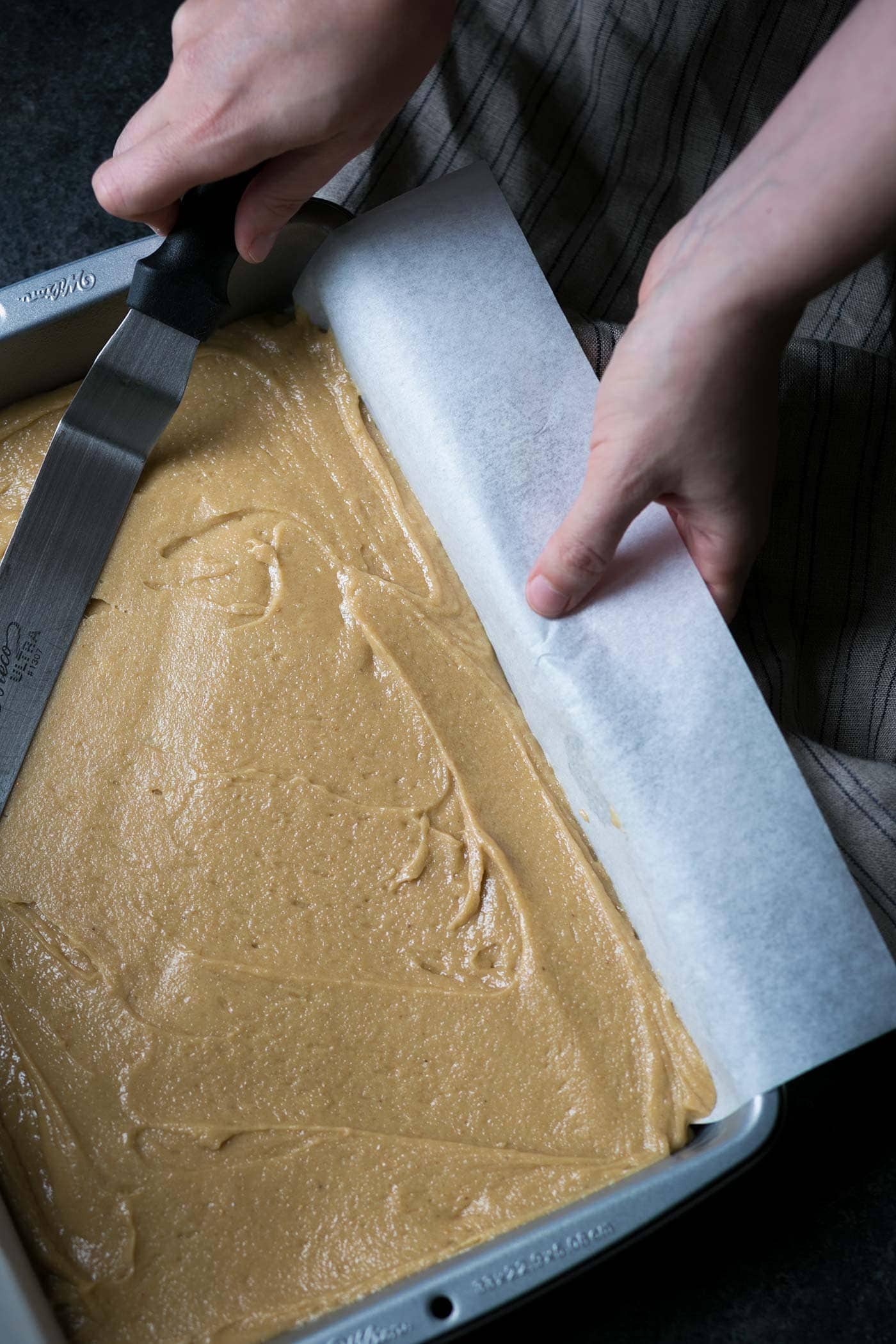 These decadent Salted Chocolate-Swirled Tahini Cashew Bars are soft, rich, and a perfect balance of flavors. Perfect for parties! SavorySimple.net