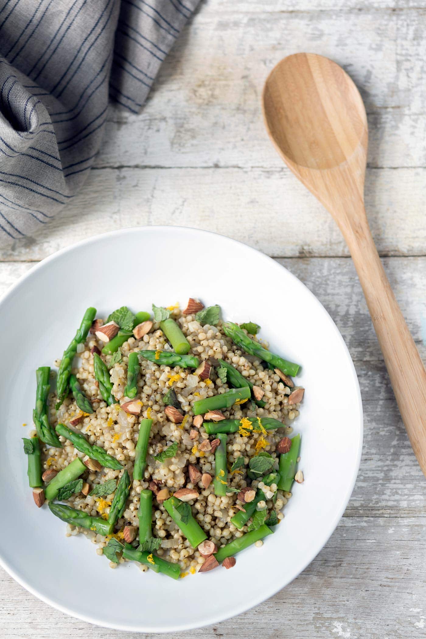 This flavorful Sorghum, Orange and Asparagus Salad is perfect as a side dish. It can also be served in larger portions for a healthy, gluten-free, vegetarian meal! SavorySimple.net
