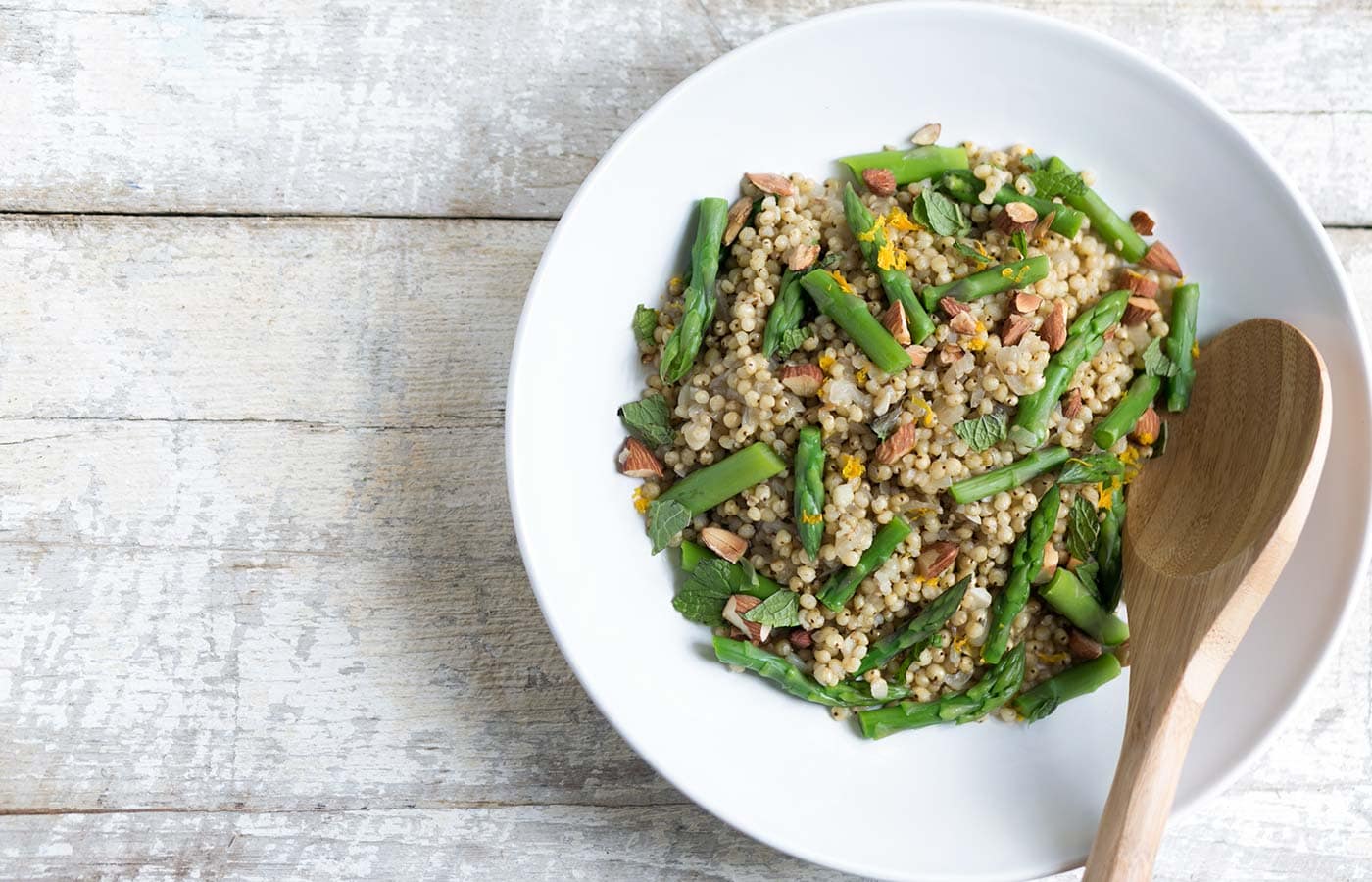 This flavorful Sorghum, Orange and Asparagus Salad is perfect as a side dish. It can also be served in larger portions for a healthy, gluten-free, vegetarian meal! SavorySimple.net