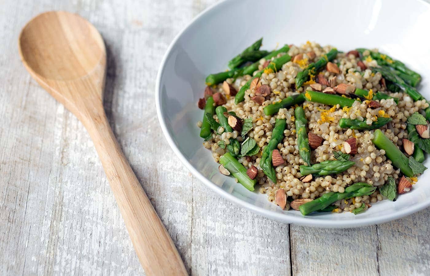 This flavorful Sorghum, Orange and Asparagus Salad is perfect as a side dish. It can also be served in larger portions for a healthy, gluten-free, vegetarian meal! SavorySimple.net