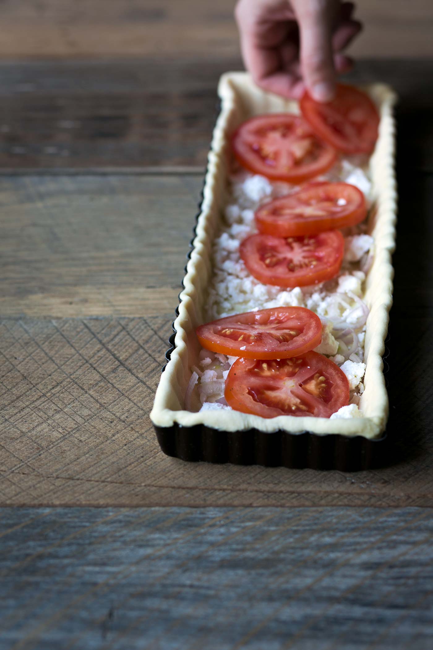 This Tomato Feta Egg Tart is perfect as an appetizer, side dish, or even for breakfast. It’s beautiful and incredibly delicious. SavorySimple.net
