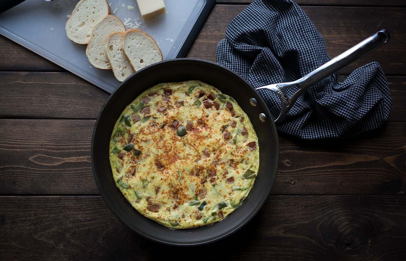This Smokey Andouille Sausage Frittata is a perfect breakfast for powering through the week! It’s also a lovely weekend brunch option. SavorySimple.net
