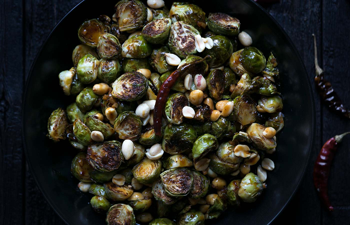 These spicy Kung Pao Brussels Sprouts are a tasty, vegetarian twist on a classic Chinese take-out dish. Get the easy-to-follow recipe from SavorySimple.net