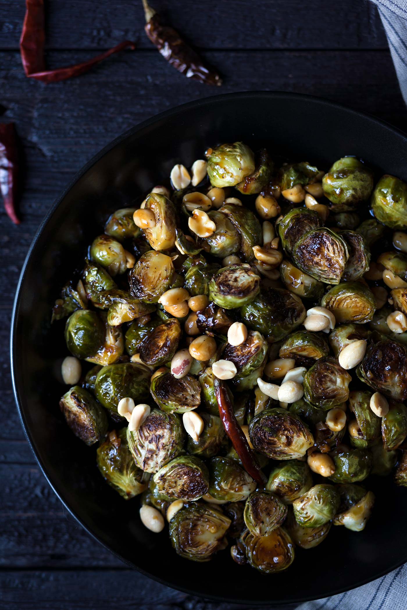 These spicy Kung Pao Brussels Sprouts are a tasty, vegetarian twist on a classic Chinese take-out dish. Get the easy-to-follow recipe from SavorySimple.net