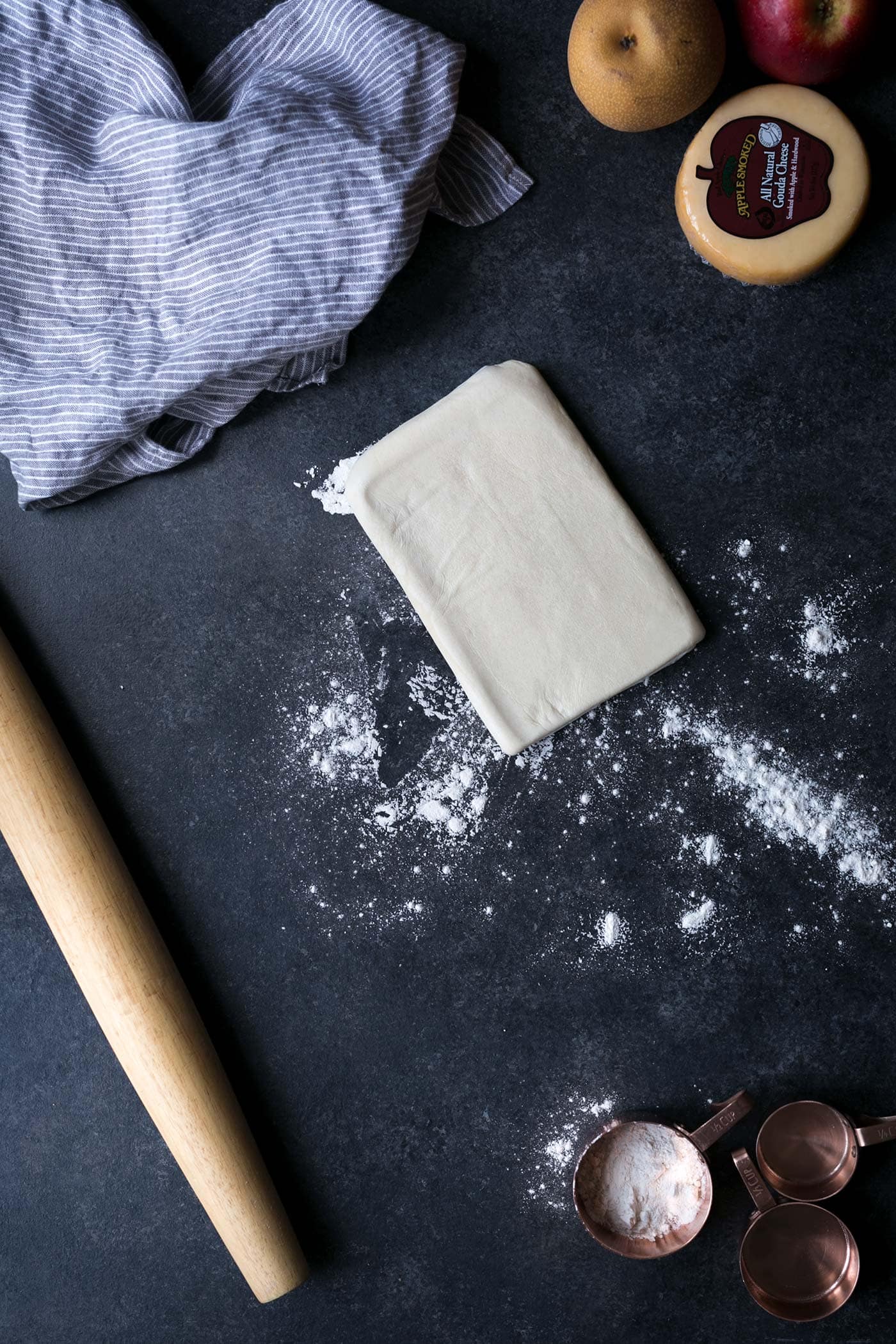 Baked Gouda in Puff Pastry is perfect for easy entertaining, especially around the holidays! This recipe can be prepared using either regular or smoked gouda. SavorySimple.net.
