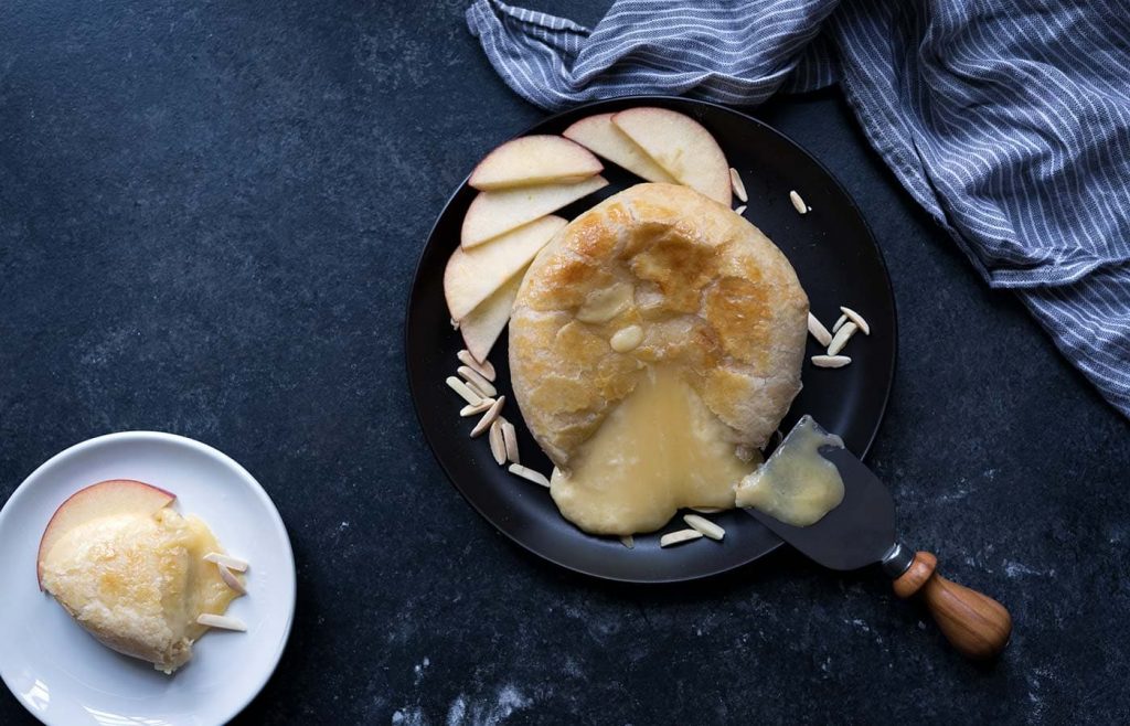 Baked Gouda in Puff Pastry is perfect for easy entertaining, especially around the holidays! This recipe can be prepared using either regular or smoked gouda. SavorySimple.net.