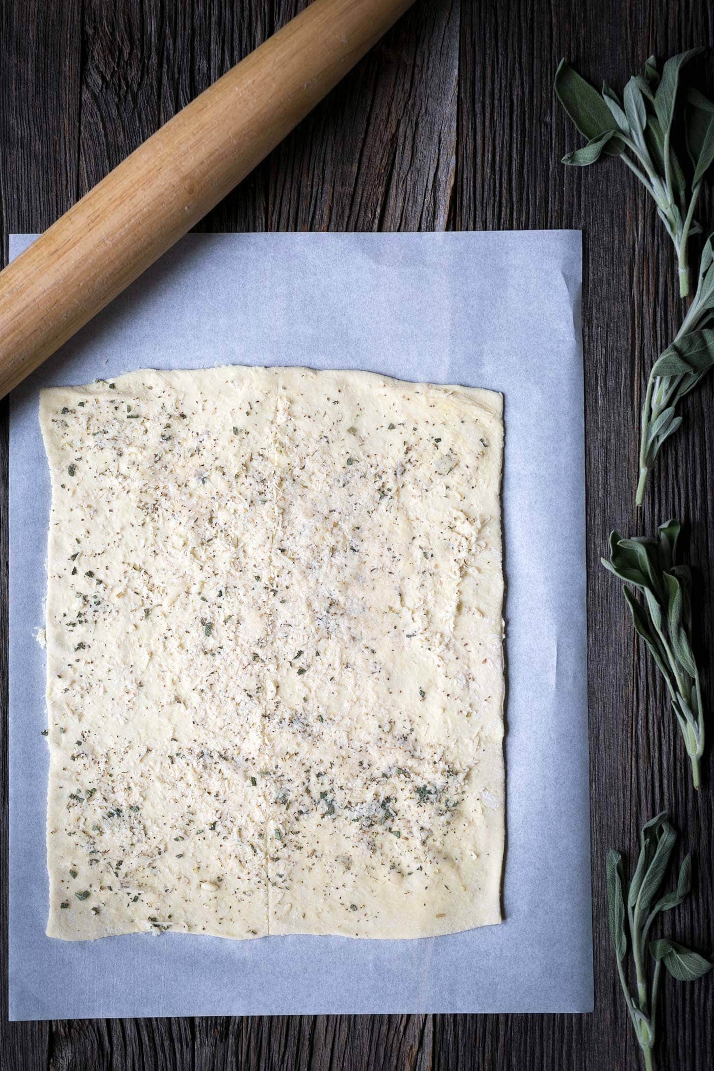Savory Palmiers with Cheese and Herbs are perfect party food! Prepare them in advance and serve at room temperature with wine or cocktails.