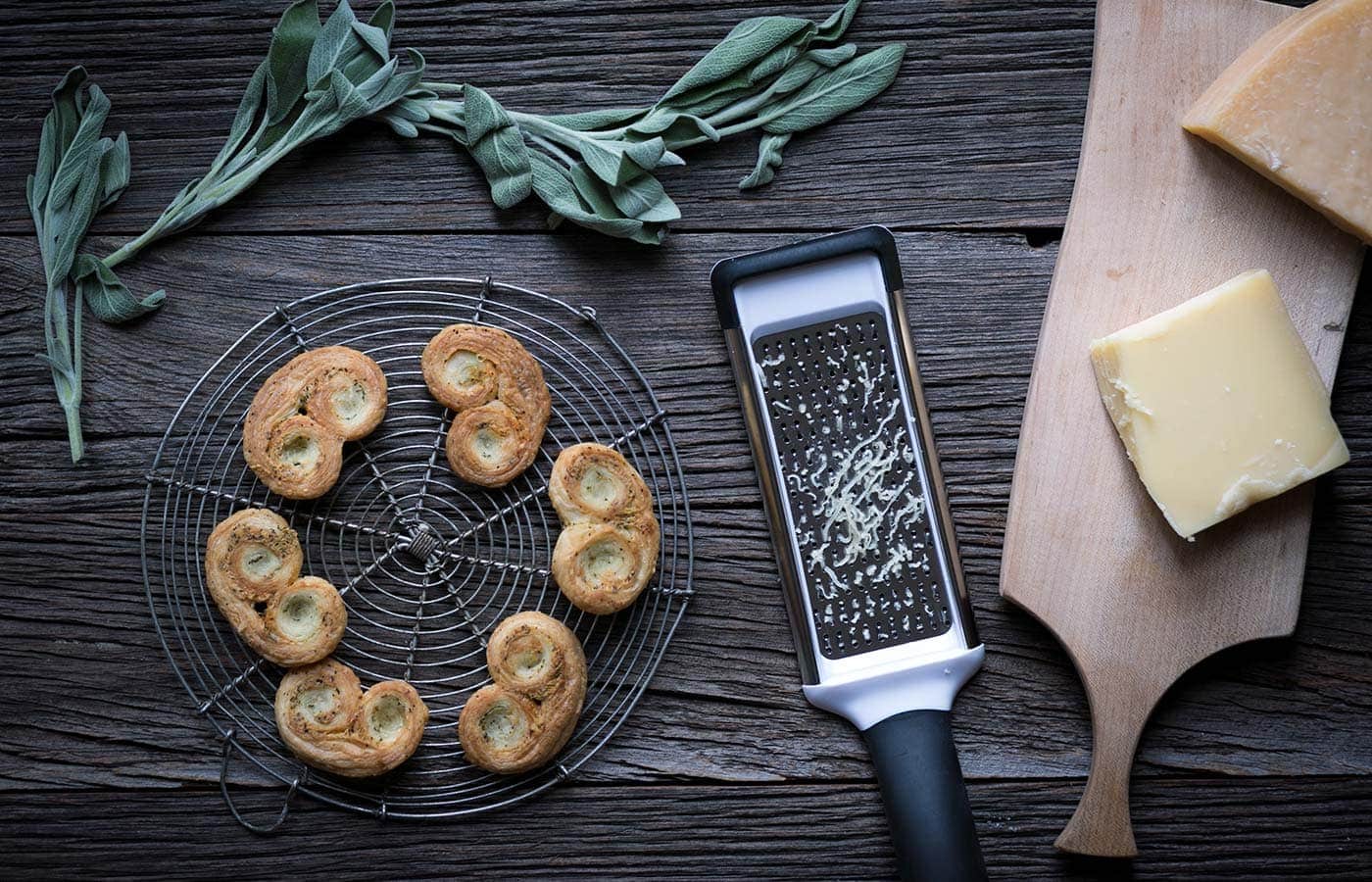 Savory Palmiers with Cheese and Herbs are perfect party food! Prepare them in advance and serve at room temperature with wine or cocktails.