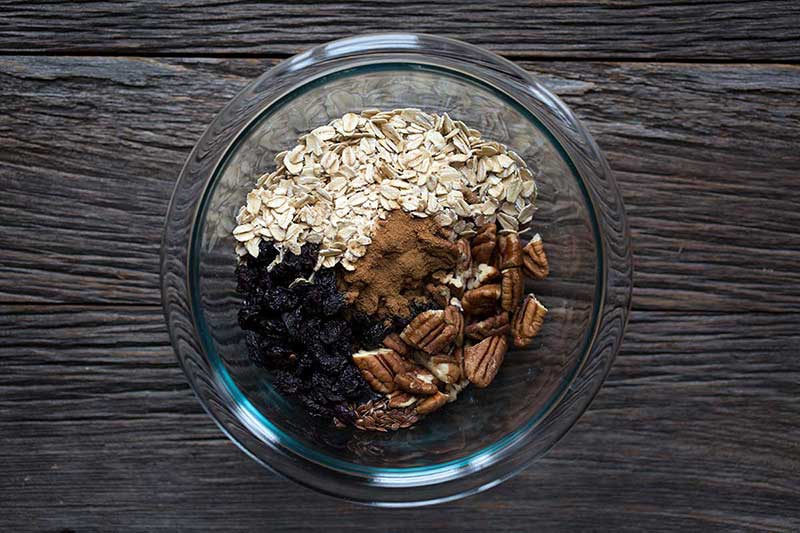 muesli ingredients in a glass bowl