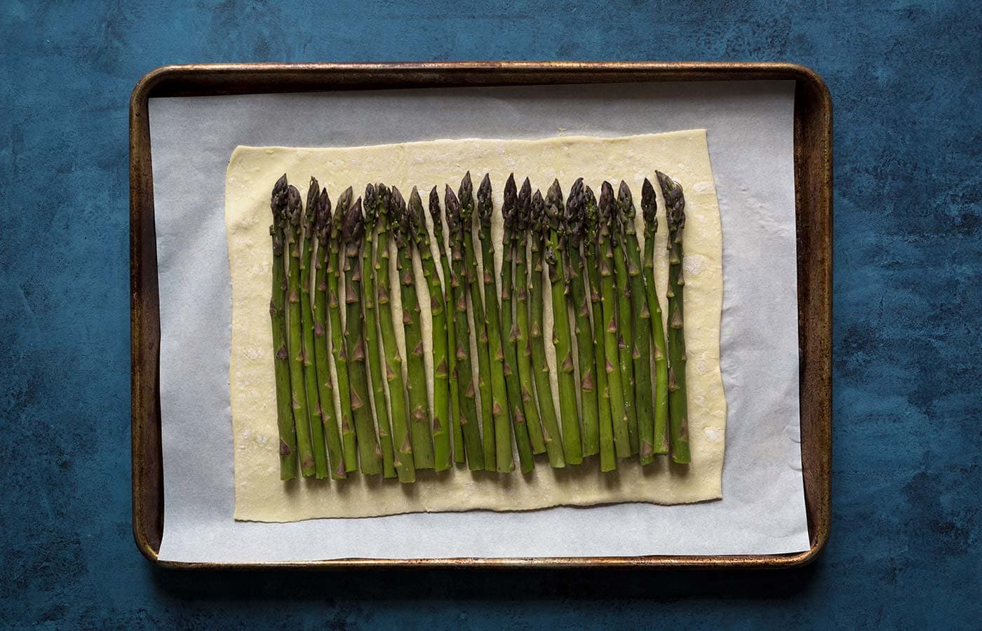 This asparagus egg tart comes together quickly with a few simple ingredients, and is perfect for spring and summer gatherings! Get the recipe from Savory Simple.
