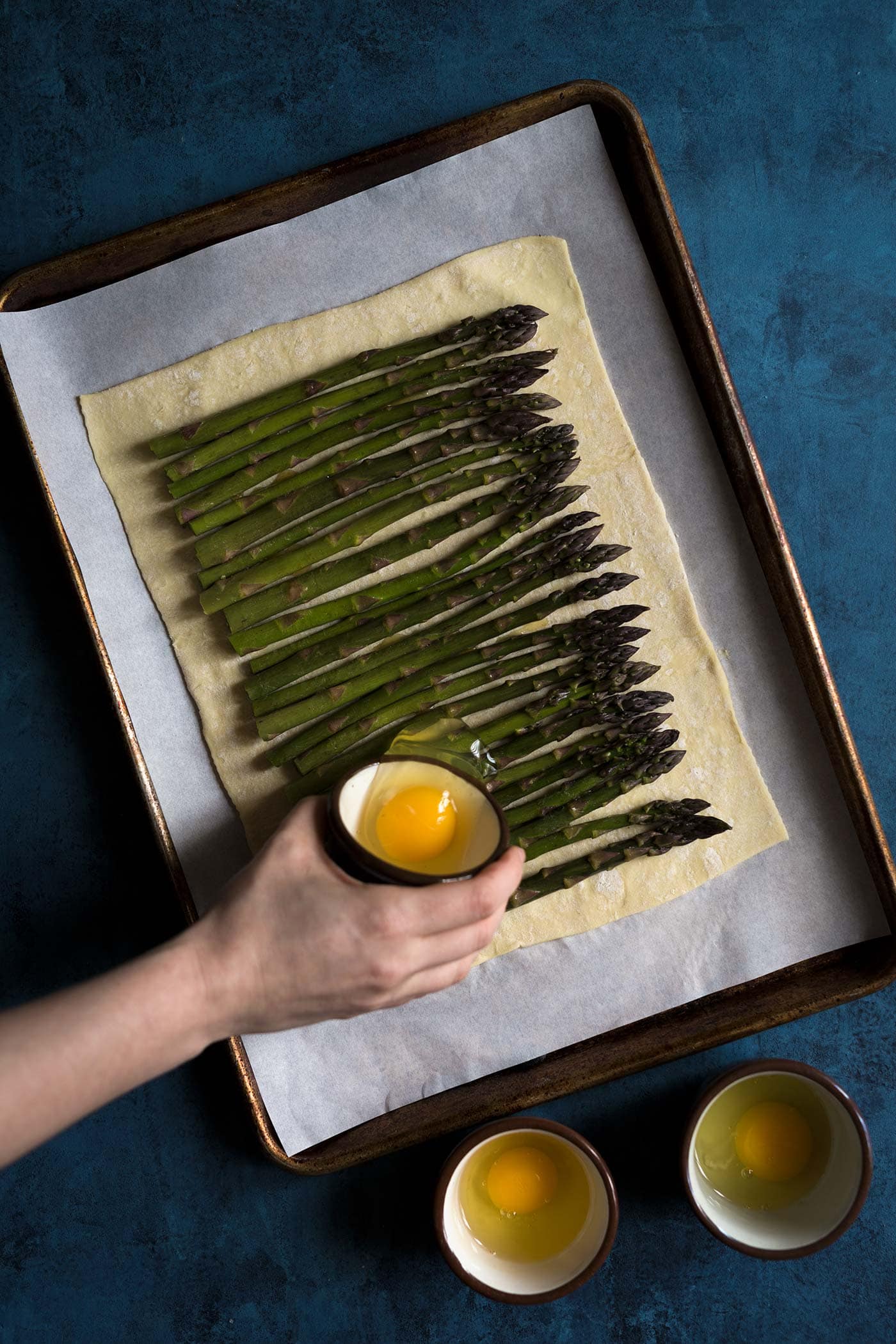 This asparagus egg tart comes together quickly with a few simple ingredients, and is perfect for spring and summer gatherings! Get the recipe from Savory Simple.