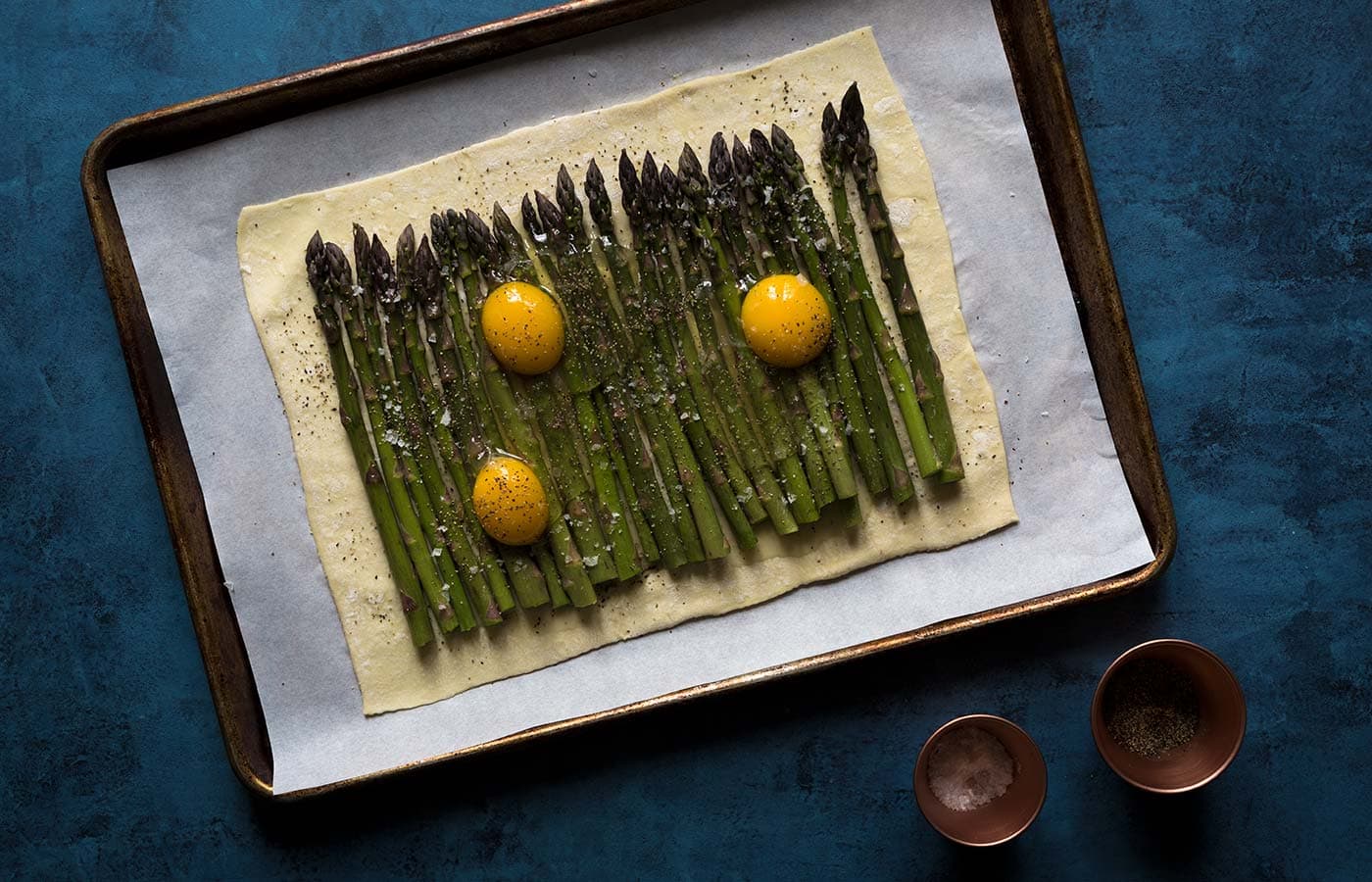 This asparagus egg tart comes together quickly with a few simple ingredients, and is perfect for spring and summer gatherings! Get the recipe from Savory Simple.