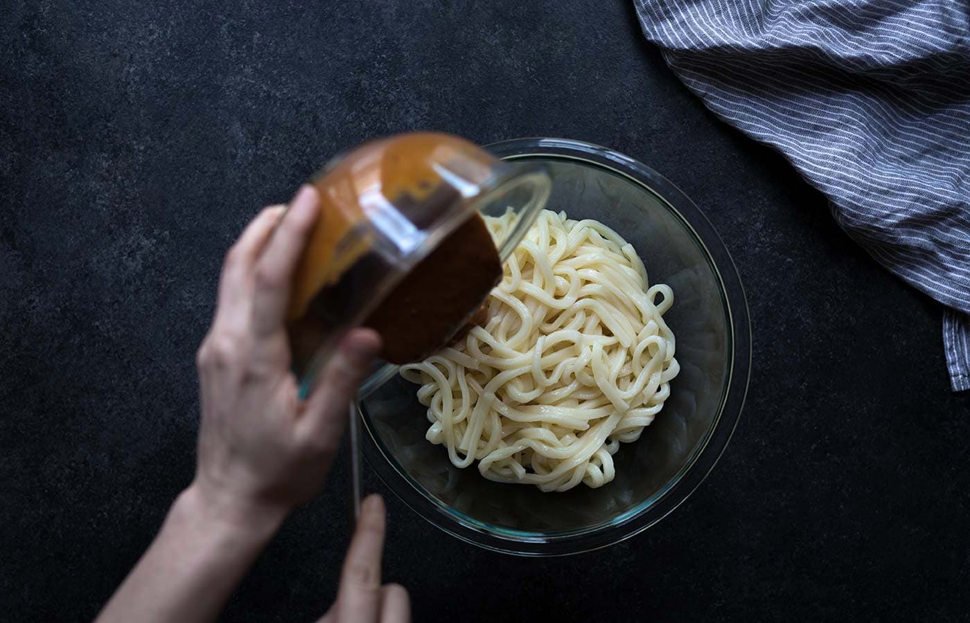 Short on time? These Spicy Cashew Butter Udon Noodles come together in 10 minutes! Get the recipe from Savory Simple.