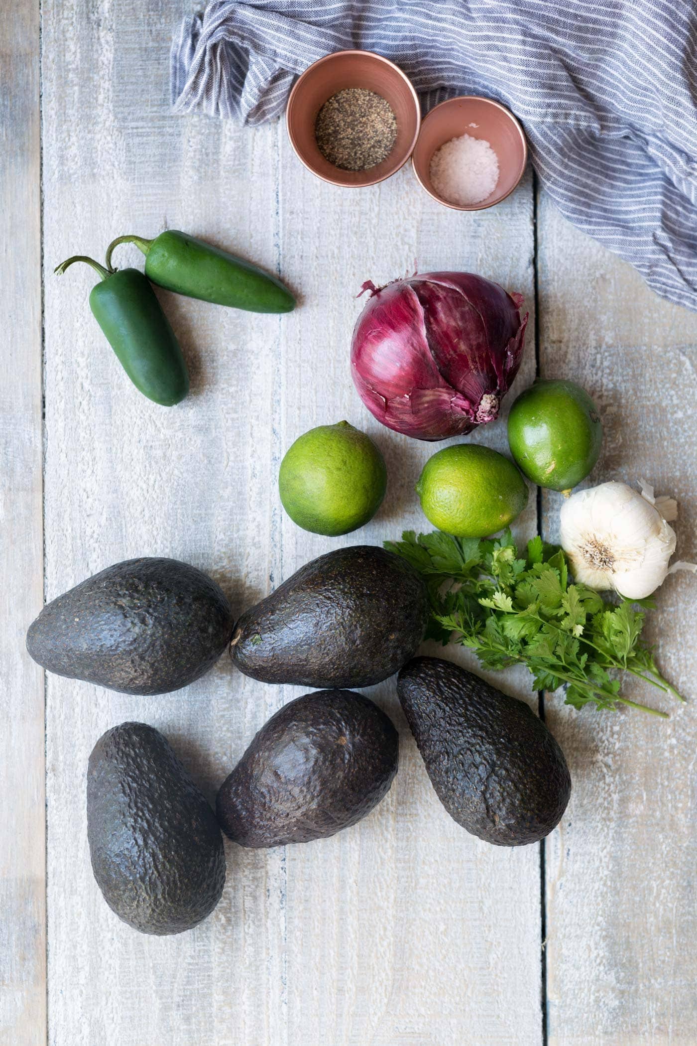 Learn how to make perfect guacamole that will stay fresh and bright green for days! Get the recipe and technique from Savory Simple.