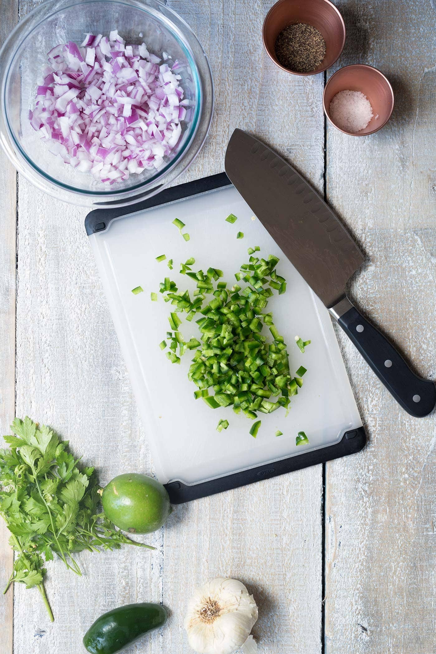 Learn how to make perfect guacamole that will stay fresh and bright green for days! Get the recipe and technique from Savory Simple.