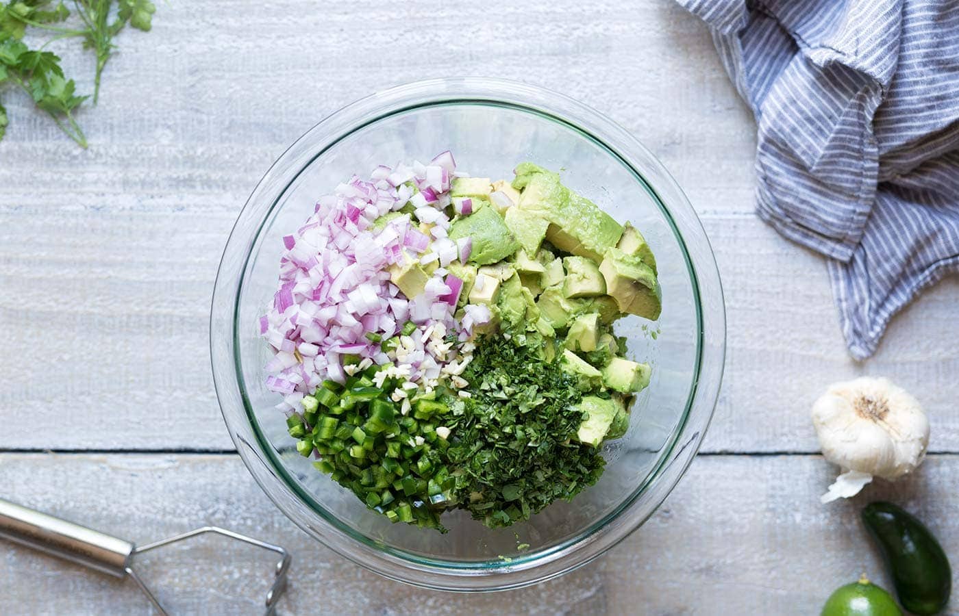 Learn how to make perfect guacamole that will stay fresh and bright green for days! Get the recipe and technique from Savory Simple.