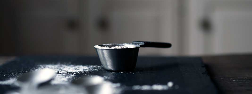 Measuring cup with flour