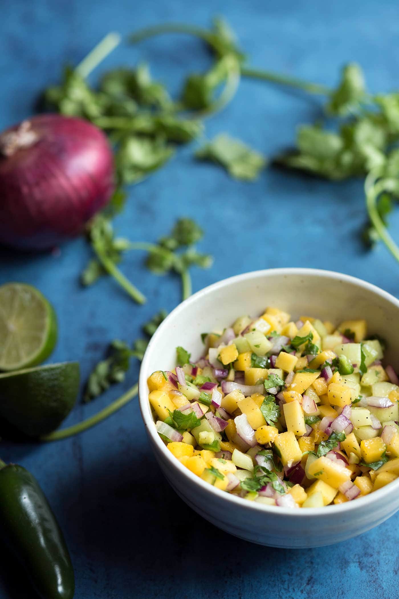 A photo of mango salsa in a bowl.
