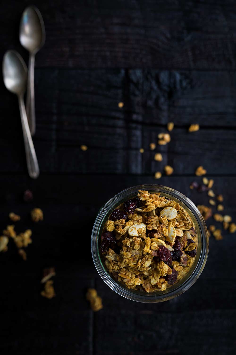 A photo of the finished pumpkin granola, which has a deeper orange color than the uncooked photos.