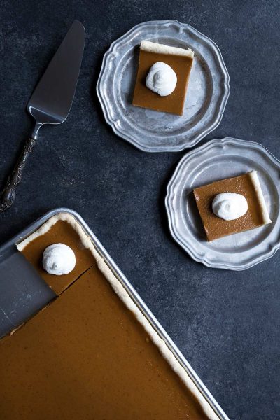 Pumpkin Slab Pie is the perfect solution if you’re serving a larger group! It makes 24 (possibly even 30) slices, providing a perfect portion of this classic fall dessert.