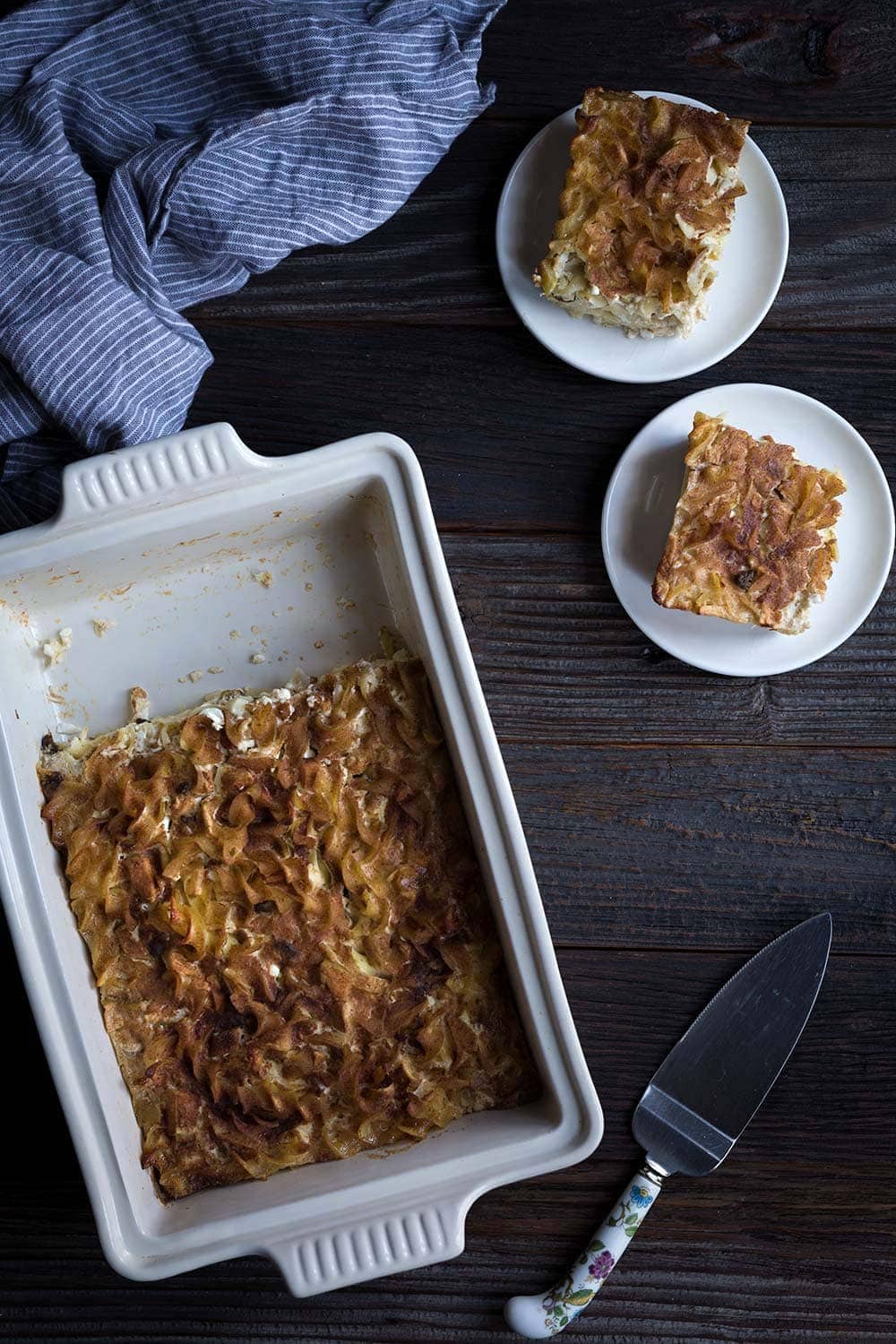 This sweet Noodle Kugel with apples is perfect for celebrating Jewish holidays including Chanukah and Passover! Sour cream, cottage cheese, and a cinnamon-sugar topping help make this a perfect comfort food dish.