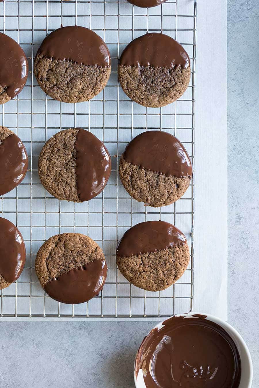 Baked gingerbread cookies freshly dipped in chocolate 