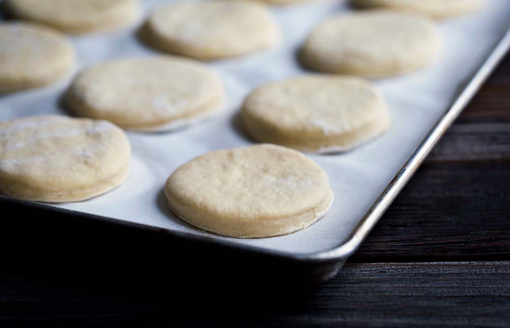 A photo of english muffin dough, pre-rise.