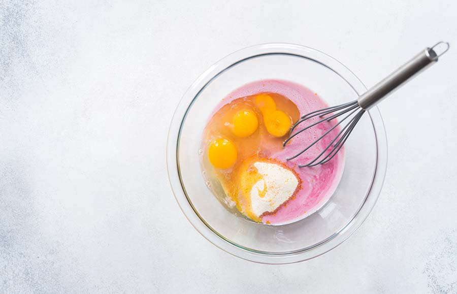 A photo of blood orange cake ingredients in a bowl. 