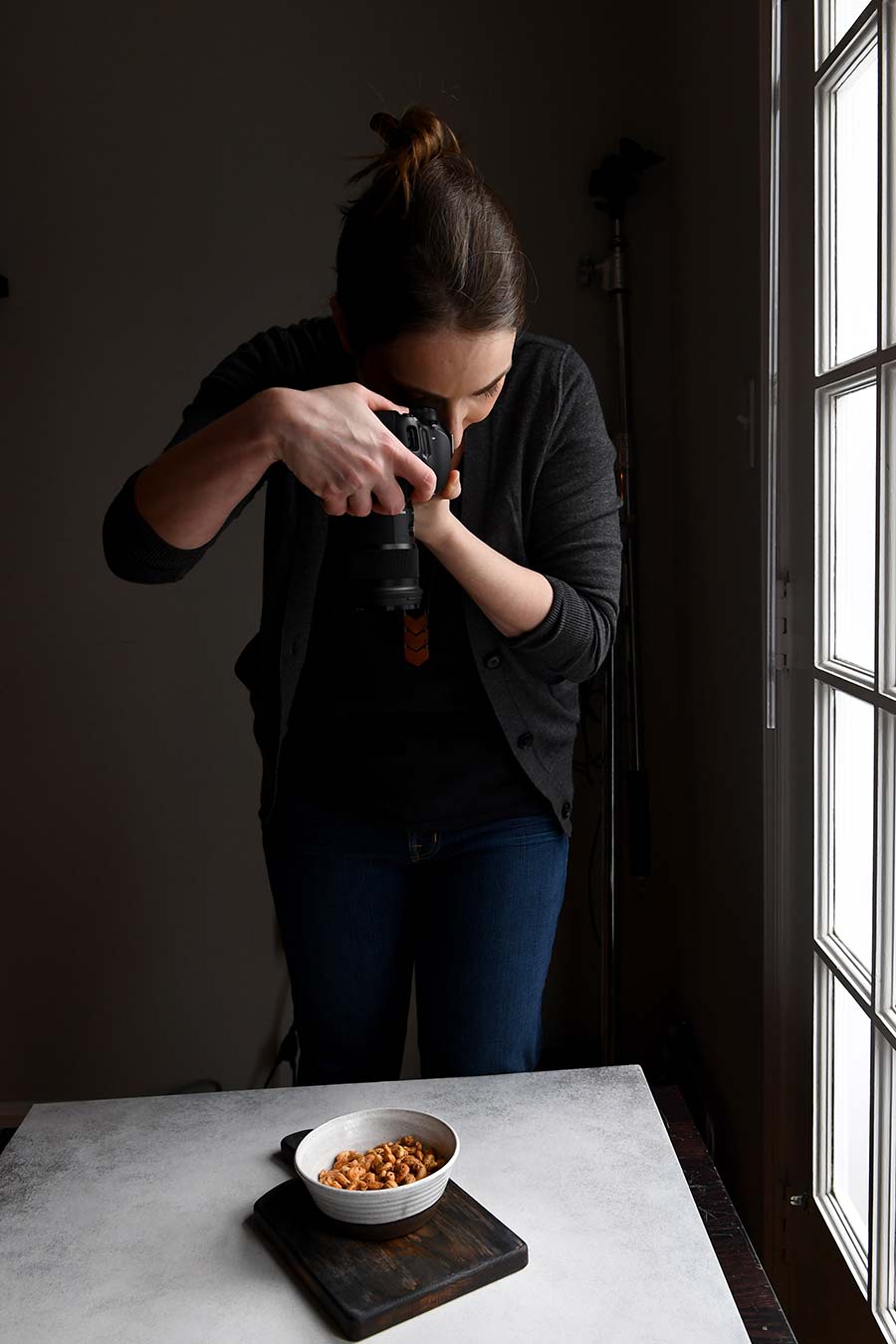 Jennifer Farley, creator of Savory Simple, photographing in her home studio.