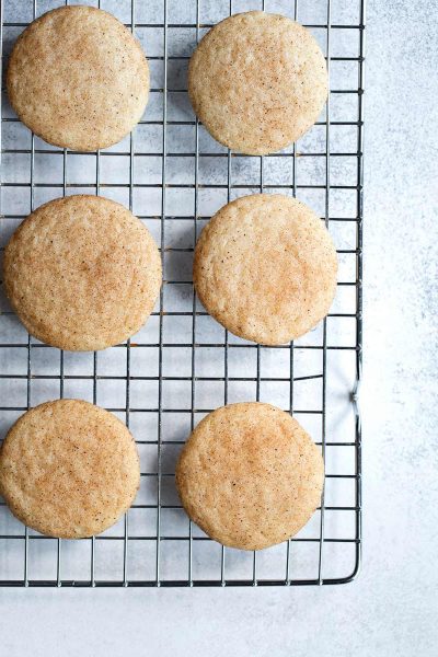 Snickerdoodle recipe shot overhead on a cooling rack.