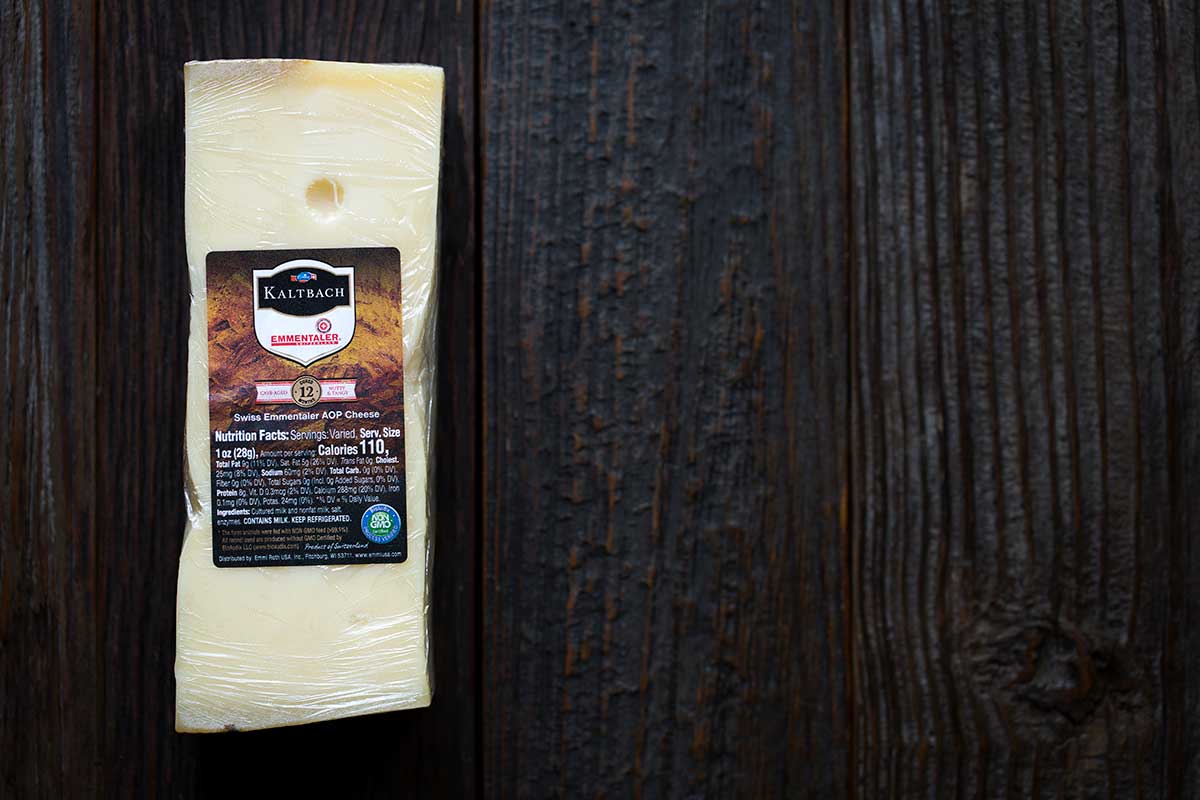 A block of aged swiss cheese from Emmi USA.