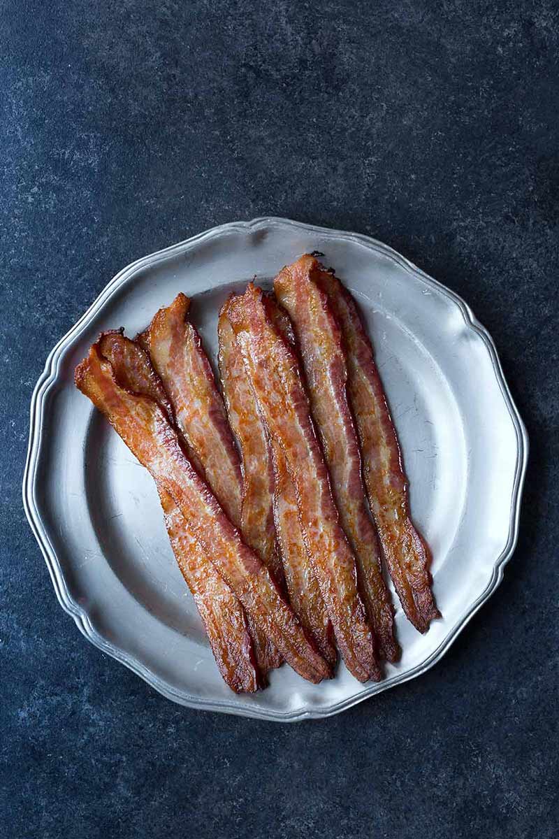 Microwave bacon on a pewter plate.
