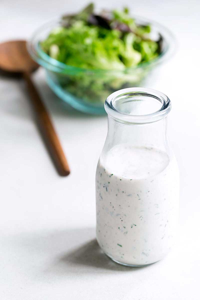 Buttermilk ranch dressing recipe in a glass jar.