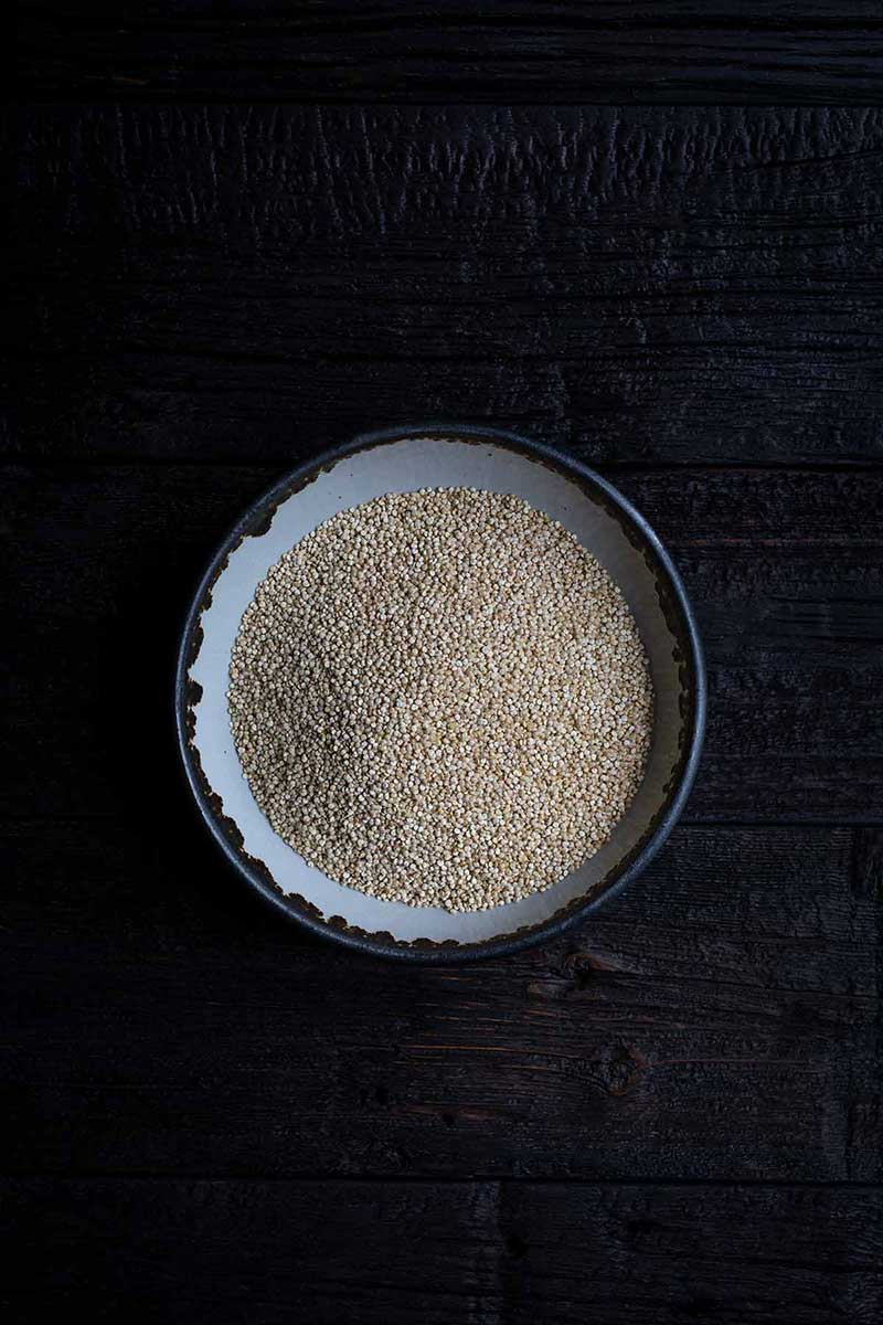 Uncooked white quinoa in a bowl