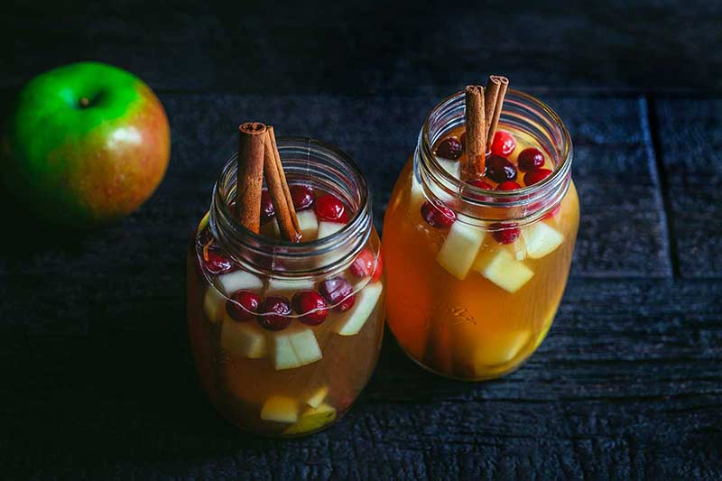 A closeup photo of apple cider sangria.