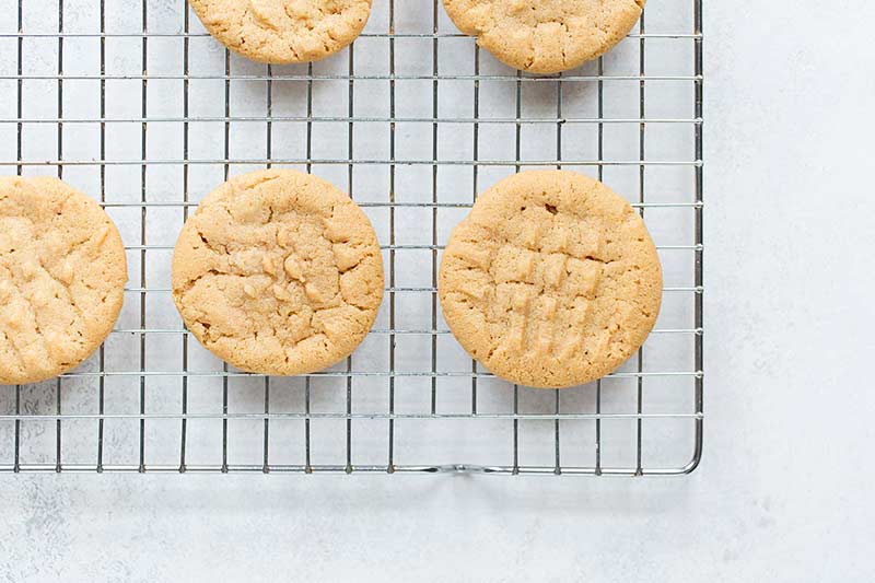 overhead image: soft homemade cookies with crisscross pattern on a metal cooling rack