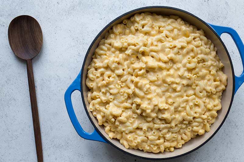 Macaroni and Cheese in a blue casserole dish