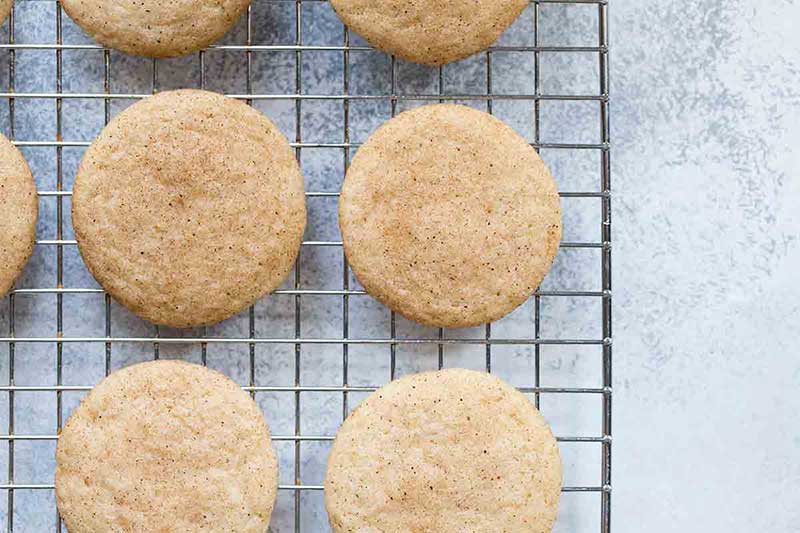 Snickerdoodles on a cooling rack.