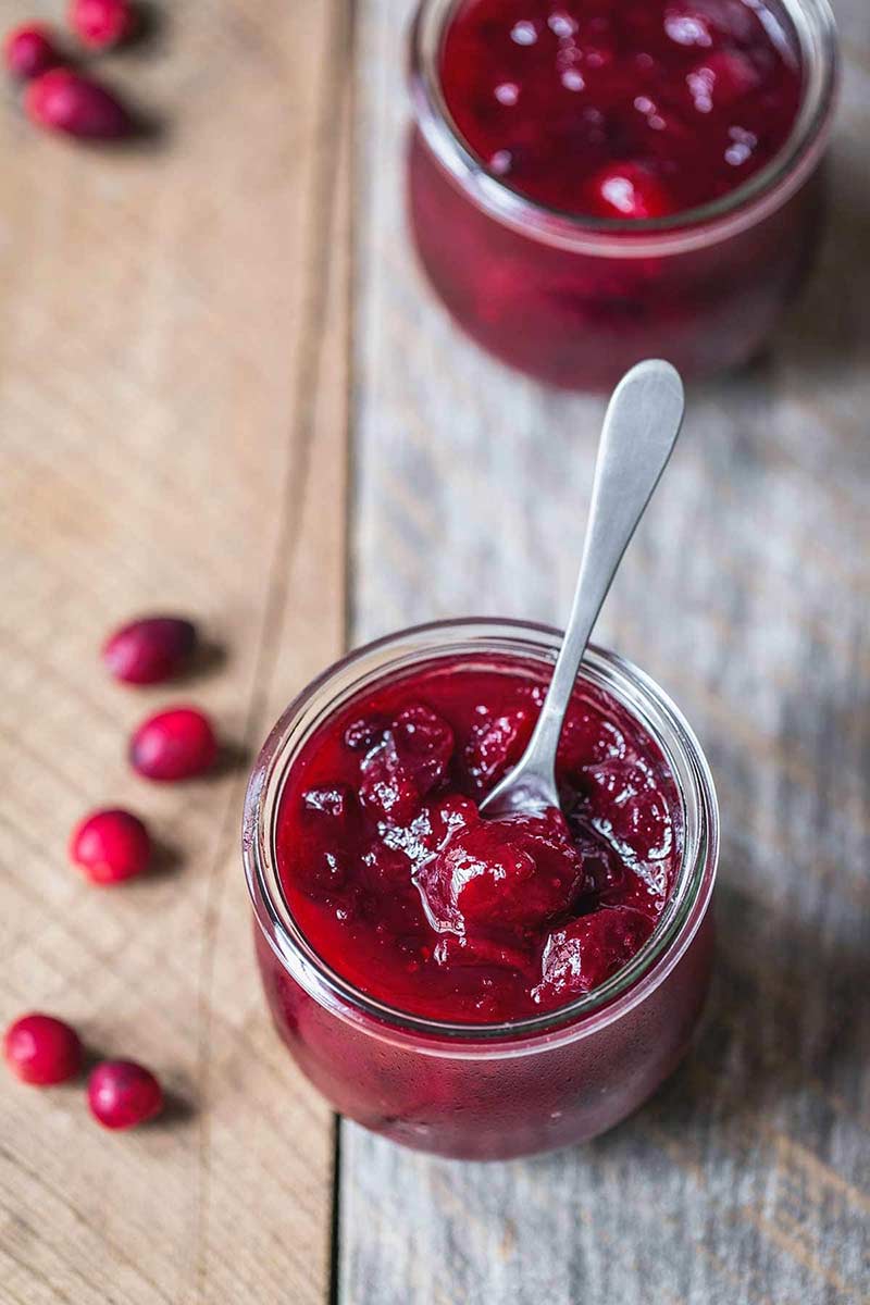 Homemade cranberry sauce with a spoon
