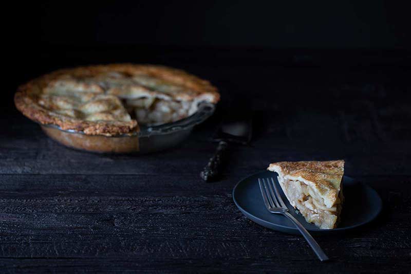 A slice of homemade apple pie.