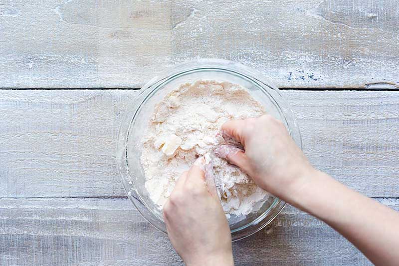 A photo of cobbler topping being prepared.