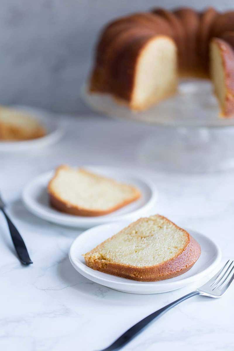 A photo of rum cake and slices of rum cake.
