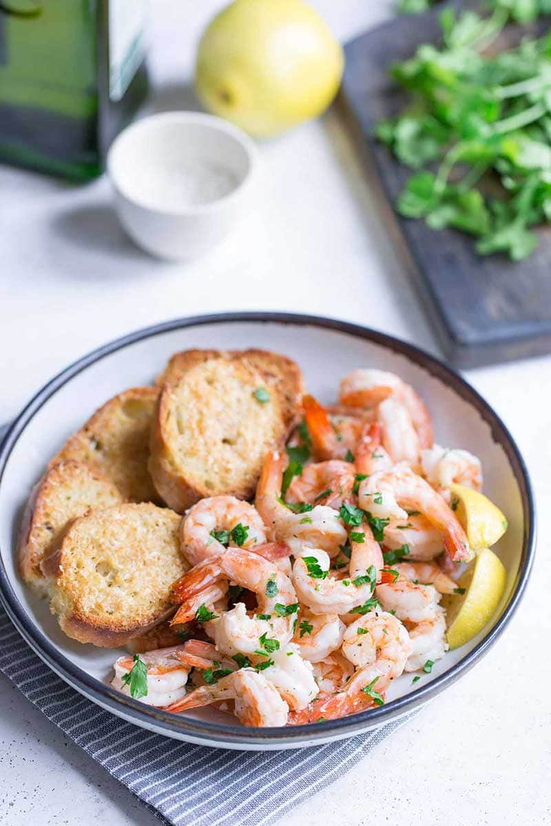 Bowl with garlic butter shrimp scampi