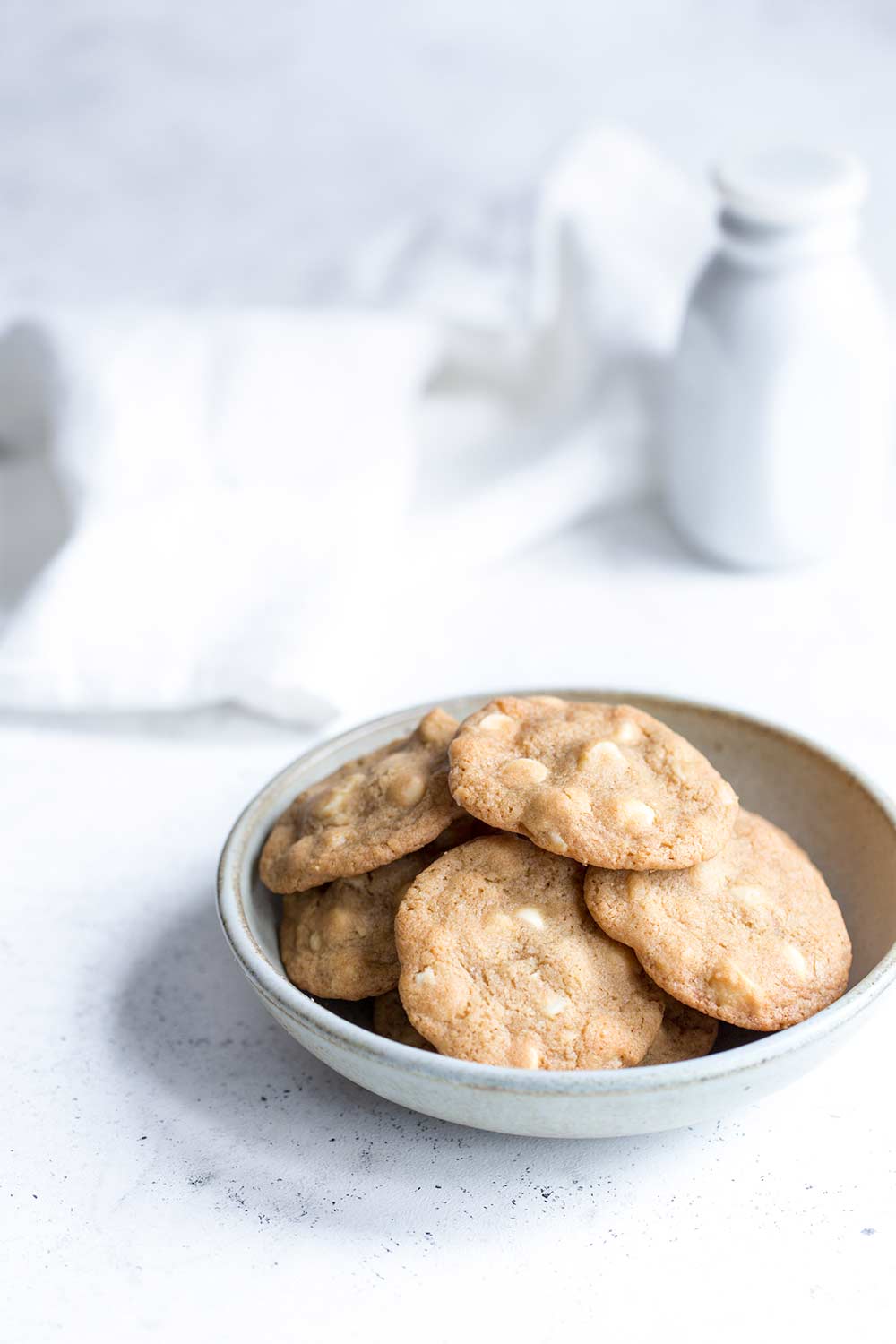 White chocolate macadamia nut cookies in a bowl