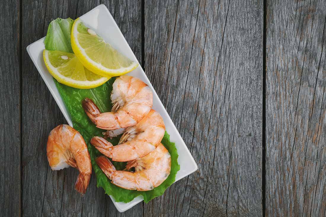Shrimp on a plate with lemon