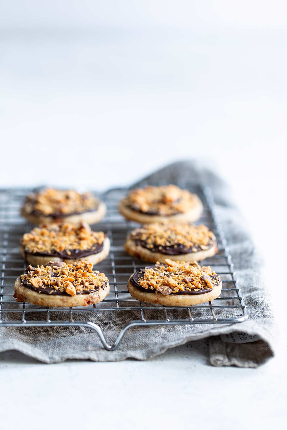 Butterfinger Shortbread Cookies on a cooling rack