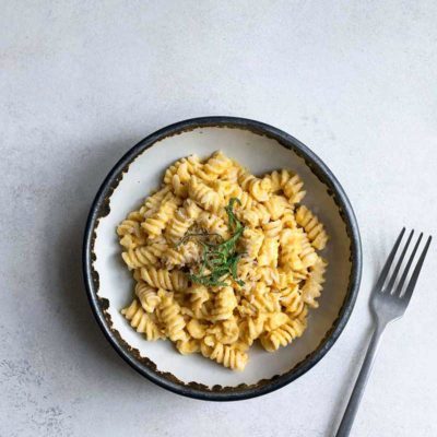 Creamy, homemade butternut squash pasta with sage in a bowl