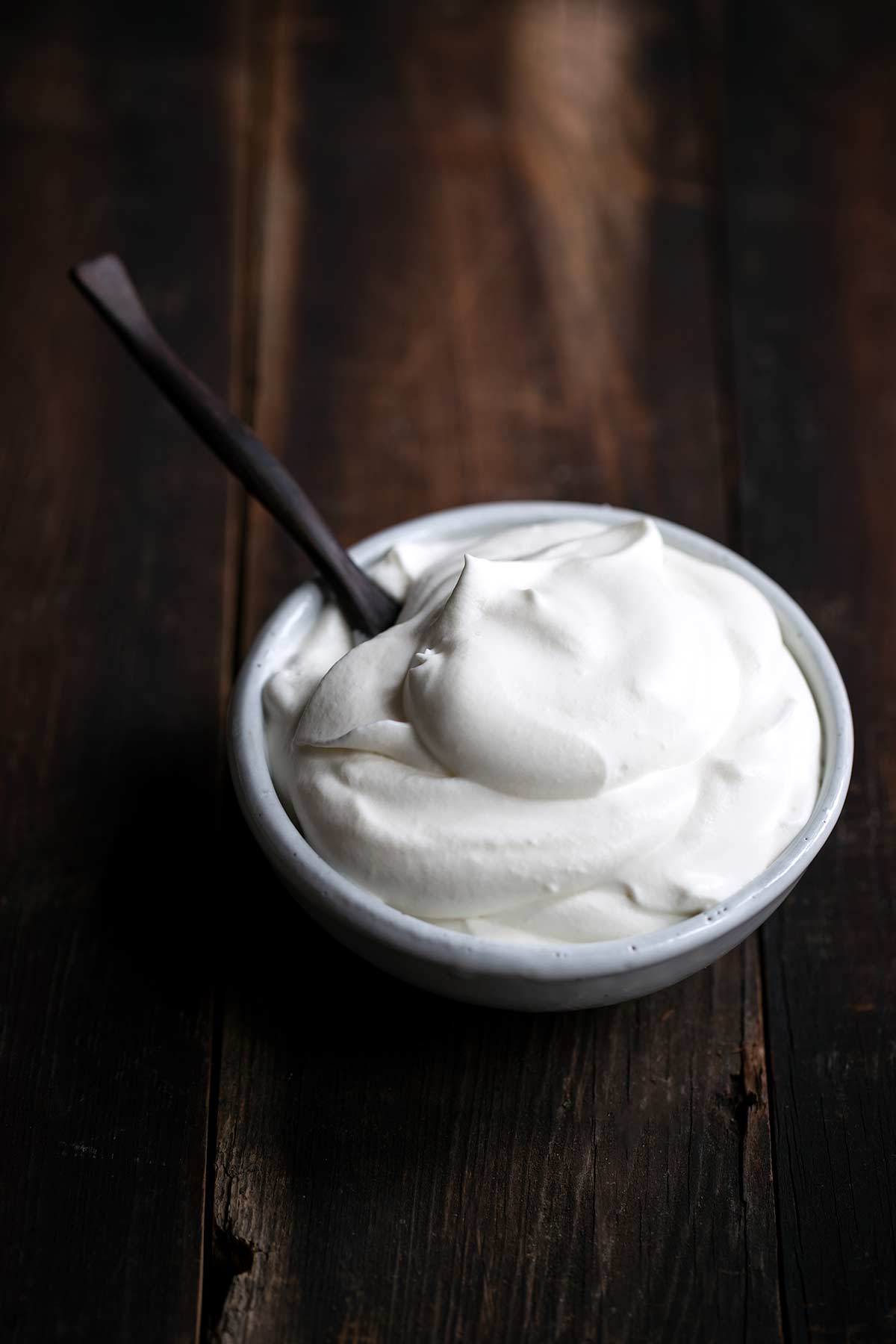 A closeup of perfectly whipped cream prepared with this "How to Make Whipped Cream" tutorial